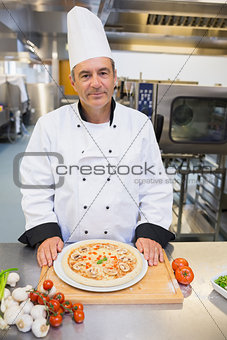Chef with a pizza