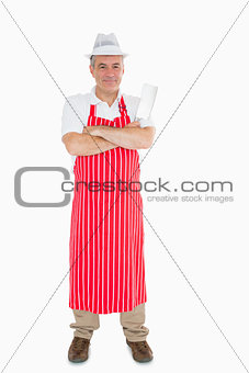 Butcher in apron with meat cleaver