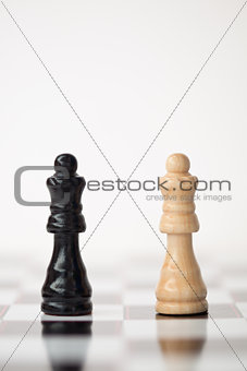 Chess pieces standing next to each other