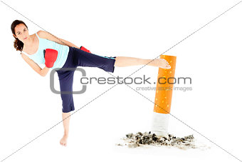 Woman kicking a giant cigarette