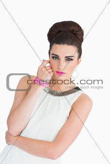 Woman with pink lips and a beehive