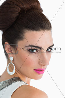 Sixties style woman looking over shoulder