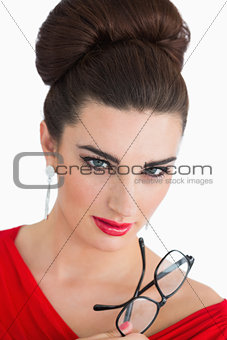 Woman looking at camera while wearing red