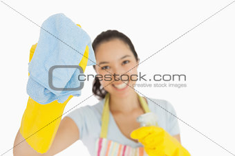 Laughing woman wiping with a rag