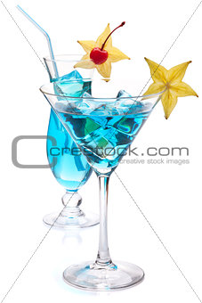Two blue tropical cocktails