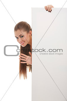 Smiling woman with blank board sign