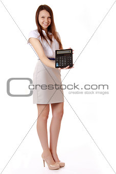 Female student with a calculator in hand. Laughing schoolgirl sh