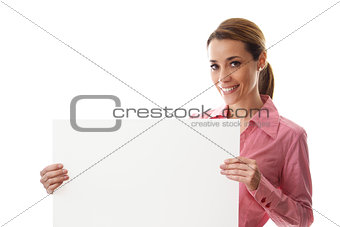 happy businesswoman holding billboard with text space