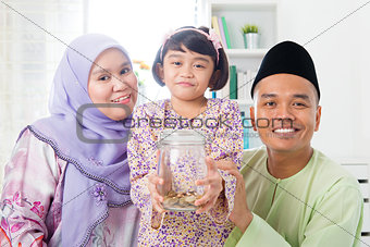 Malay family saving money