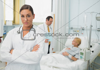 Female doctor folding her arms