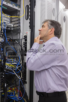 Technician searching for a solution in the server case