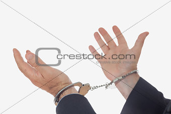 Closeup of hands with handcuffs