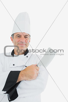 Portrait of chef with meat cleaver