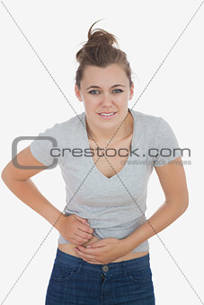 Beautiful woman suffering from stomachache