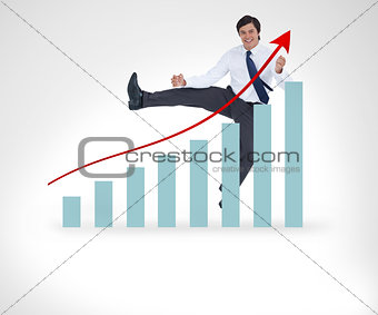 Businessman jumping over the graphical presentation