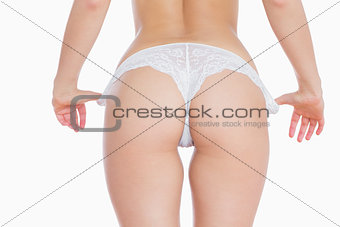 Woman removing panties
