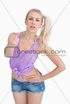 Woman showing middle finger