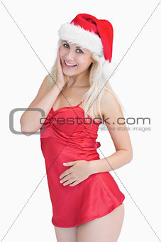 Excited woman wearing santa hat