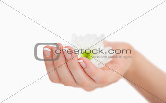 French manicured hand holding flowers