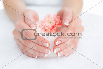 French manicured fingers and flower