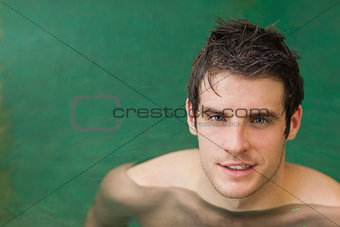 Handsome man in the swimming pool