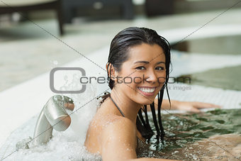 Woman smiling in hydrotherapy pool