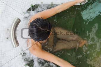 Woman relaxing in the jacuzzi