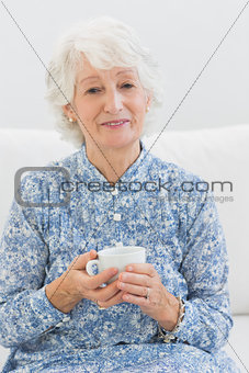 Elderly cheerful woman looking at camera