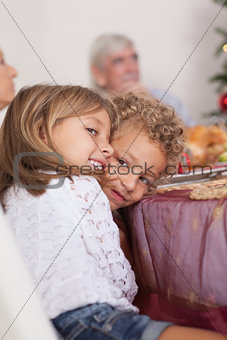 Siblings joking with each other at christmas