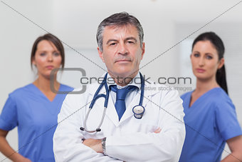 Doctor and his team of nurses