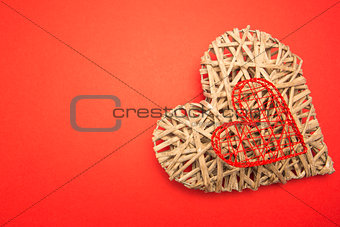 Wicker heart ornament and red heart shaped box