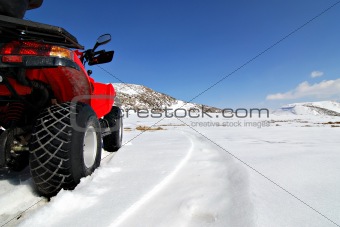 red quad in snow