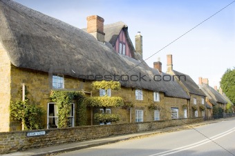 Row of houses with thatched rooves