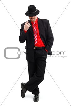 Confident man in black with pipe