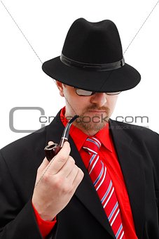 Confident man in black with pipe