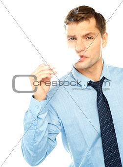 Young businessman smoking cigarette