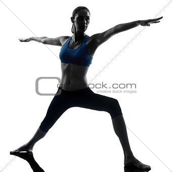 woman exercising yoga warrior position 2