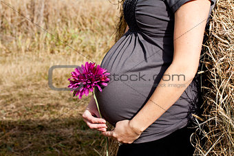Pregnant Woman with flower