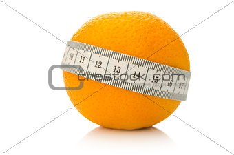 Orange fruit wrapped with measuring tape