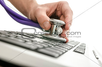 Testing a computer keyboard with stethoscope