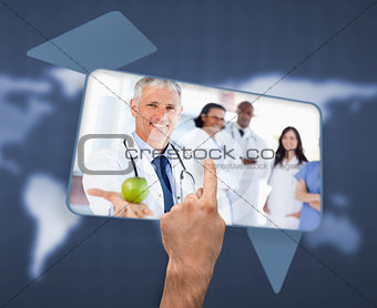 Hand selecting image of doctor holding apple