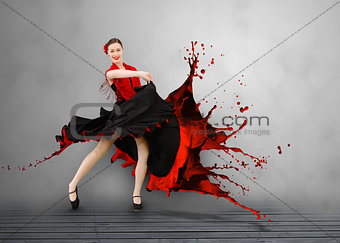 Flamenco dancer with dress turning to paint splattering