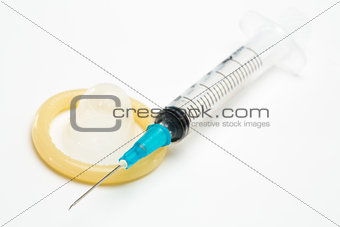 Medical syringe and a condom