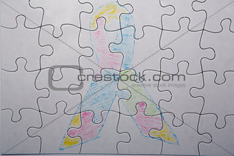 Crayon drawing of autism and aspergers ribbon