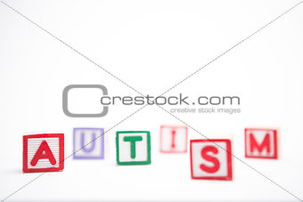 Autism spelled out in letter blocks