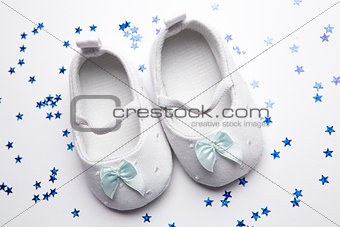 Baby blue booties with confetti