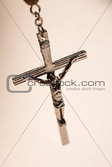 Close up of crucifix of rosary beads