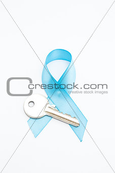 Blue ribbon for prostate cancer and silver key