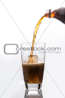 Soda pouring into glass