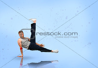 Break dancer balancing on one hand